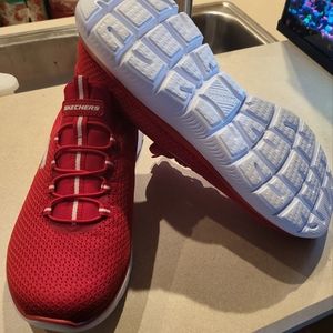 Red breathable sneakers. Sketcher Brand